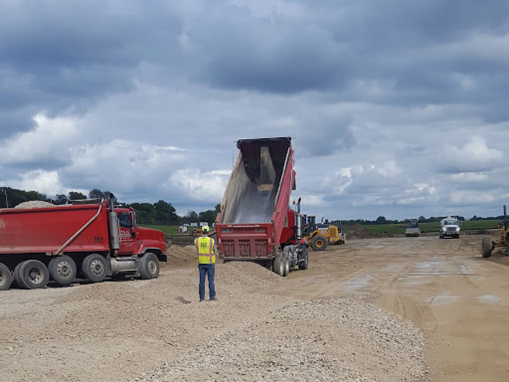 a dump truck at a job site